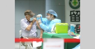 台湾新增本土确诊23718例、死亡32例